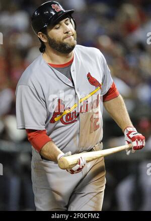 St. Louis Cardinals Lance Berkman embraces Albert Pujols after the  Cardinals won the 2011 World Series in St. Louis on October 28, 2011. The  Cardinals defeated the Texas Rangers 6-2 winning game