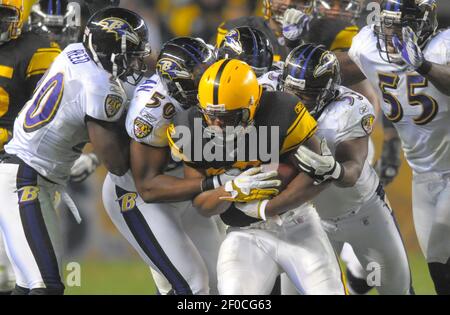 Pittsburgh Steelers running back Isaac Redman (33) is hit by Tennessee  Titans strong safety Bernard Pollard (31) in the fourth quarter of an NFL  football game in Pittsburgh, Sunday, Sept. 8, 2013. (