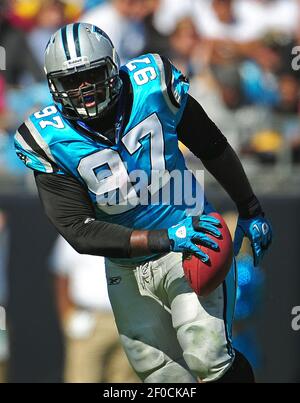 Pittsburgh Steelers' Leonard Pope (45) gets wrapped up by Carolina Panthers'  Thomas Keiser (98), Terrell McClain (97), and R.J. Stanford (25) during the  first half of their pre-season game on Thursday, August