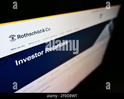 High angle view of business website with logo of French financial services company Rothschild Co. SCA on monitor. Focus on top-left of screen. Stock Photo