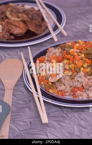 Pork adobo with fried rice. Stock Photo