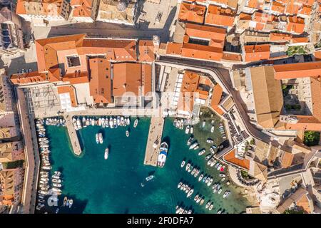 Aerial overhead drone shot of old town port in Dubrovnik in Croatia summer morning Stock Photo