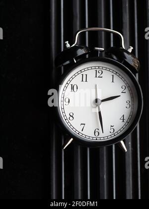 black vintage or retro alarm clock Stock Photo