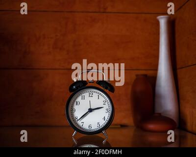 black vintage or retro alarm clock Stock Photo
