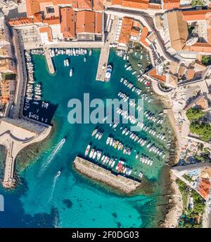 Aerial overhead drone shot of old town port in Dubrovnik in Croatia summer morning Stock Photo