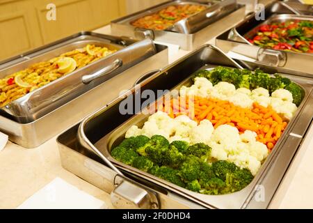 Steamed vegetables in a dining room at breakfast in the hotel Stock Photo