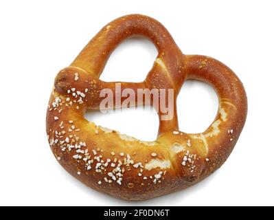 freshly baked pretzel isolated on white background, top view Stock Photo