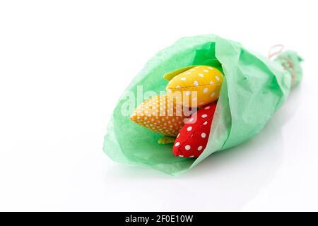 Woven tulip flowers on a white background. Congratulatory banner or post for sale on Instagram. Stock Photo