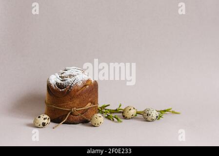 Easter cakes (Orthodox Easter cakes), quail eggs and willow branches. The scene of the Easter holiday. Festive composition on the table Stock Photo