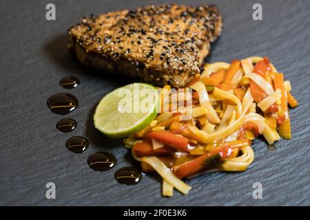 with sesame seeds breaded tuna steak Stock Photo