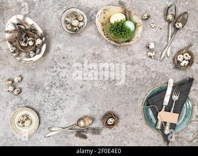 Easter table place setting with eggs decoration. Template background Stock Photo