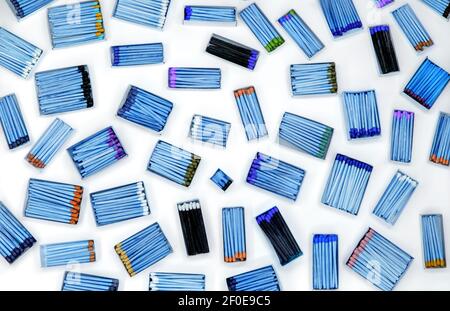 multicolored match sticks in boxes on a white background Stock Photo