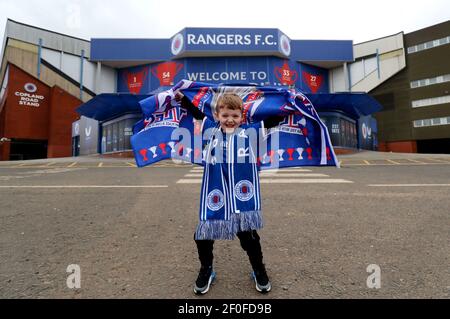 Rangers fan Arlo Low, aged 5, outside of the Ibrox Stadium, home of Rangers FC. Picture date: Sunday March 7, 2021. Stock Photo