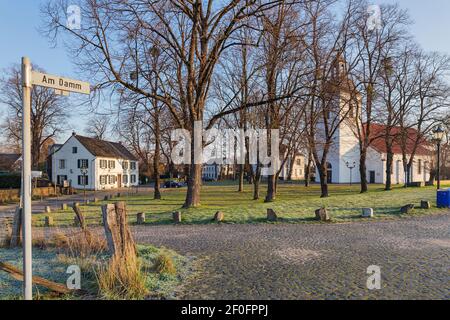 Duisburg - View to the village church which is the oldest church in Friemersheim and evangelical since 1560, protected by the dike, North Rhine Westph Stock Photo