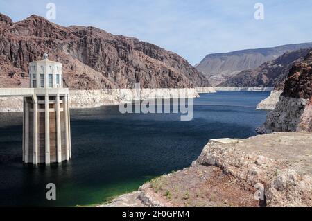 View of the pen stock towers over Lake Mead at Hoover Dam, between Arizona and Nevada states, USA.View of the pen stock towers over Lake Mead at Hoove Stock Photo