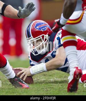 Buffalo Bills quarterback Ryan Fitzpatrick (14) ends up at the pile during  the NFL football game between the Kansas City Chiefs and the Buffalo Bills  at Arrowhead Stadium in Kansas City, Missouri.