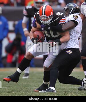 Oakland, California, USA. 3rd Jan, 2010. Baltimore Ravens linebacker Jameel  McClain #53, linebacker Ray Lewis #52, and linebacker Prescott Burgess #54  watch replay during game from the sidelines on Sunday, January 3