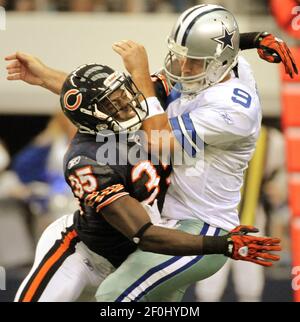 Chicago Bears cornerback Zack Bowman (L) brings down Minnesota Vikings wide  receiver Greg Lewis after a 27-yard reception during the fourth quarter at  Soldier Field in Chicago on December 28, 2009. The