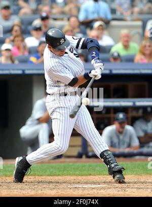 Kansas City Royals' Alex Gordon (4) makes an error on a ball hit by  New York Yankees' Derek Jeter (2) in the first inning, Tuesday,  September 29, 2009, at Yankee Stadium in