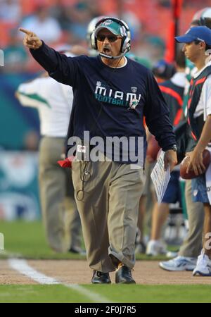 Miami Dolphins coach Tony Sparano, right, watches a replay against