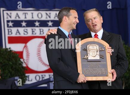 Hall of Fame president Jeff Idelson, left, presents National Baseball Hall  of Fame inductee Jeff Bagwell with his Hall of Fame plaque during an  induction ceremony at the Clark Sports Center, Sunday