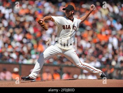 Fan favorite ANDRES TORRES and Giants mascot Lou Seal make their way across  the outfield grass at AT& T Park in …