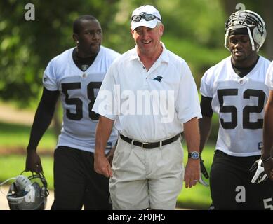 Carolina Panthers linebackers coach Ken Flajole gives instructions to  rookie Jon Beason during Beason's first practice at training camp in  Spartanburg, South Carolina, Monday, August 6, 2007. (Photo by David T.  Foster