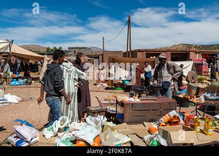 Telouet, Morocco - April 14, 2016: Street scene in the village of Telouet, in the Atlas Region of Morocco, with people in a street market. Stock Photo