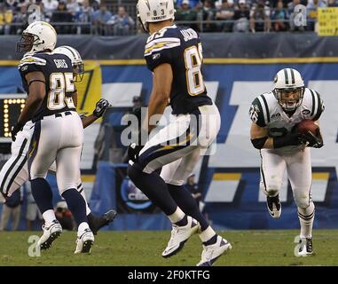 January 17, 2010: San Diego Chargers defensive tackle Luis Castillo (93)  reaches for New York Jets running back Shonn Greene (23)during the AFC  Divisional playoff at Qualcomm Stadium in San Diego, CA . (