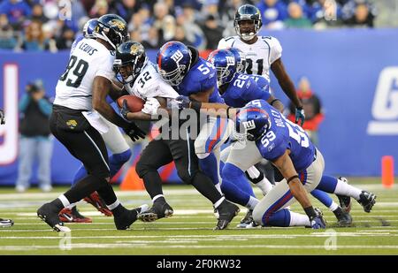 New York Giants defensive end Justin Tuck (91) during player introductions  before NFL action between the New York Giants and the Carolina Panthers at  New Meadowlands Stadium in East Rutherford, New Jersey.