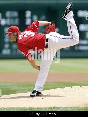 Arizona Diamondbacks starting pitcher Wade Miley delivers during the first  inning of the Wrigley Field 100th anniversary game at Wrigley Field on  April 23, 2014 in Chicago. The Cubs wore the uniforms