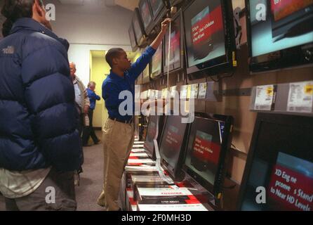 A customers plays with a Nintendo Wii display at a brand new Best Buy  electronics store in Union Square in New York on Saturday, November 14,  2009. Nintendo announced its first quarterly