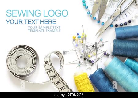 Sewing accessories template, business card type with sample logo, scissors, measuring tape, spool of thread and needle isolated  and cut-out on white Stock Photo