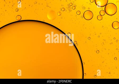 Golden bubbles. Yellow circles Abstract background Bubble oil on water Stock Photo