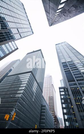 Skyscrapers on a foggy day in New York, color toned picture, USA. Stock Photo