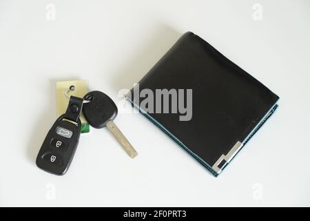 wallet car keys on a white background Stock Photo