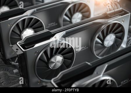 Graphics cards GPU standing in a row in mining farm or 3d render farm. IT hardware. 3d illustration Stock Photo