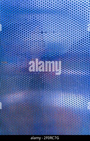 Bluish perforated sheet, Germany Stock Photo