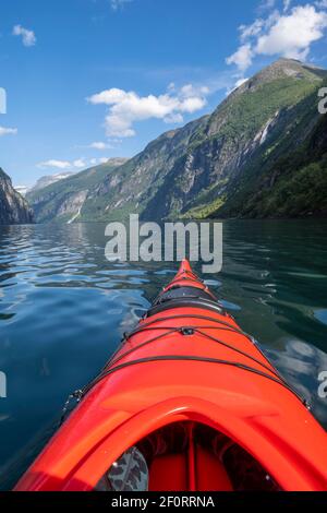 Kayak on the Geirangerfjord, near Geiranger, Norway Stock Photo