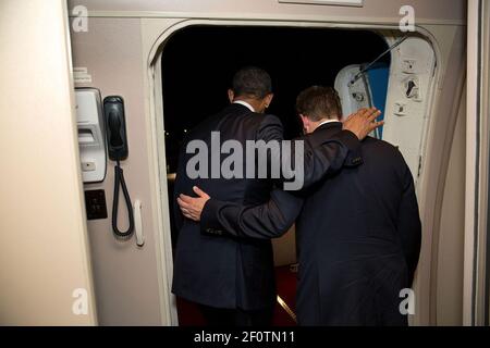 President Barack Obama and Press Secretary Jay Carney disembark from Air Force One upon arrival at Joint Base Andrews, Wednesday night, June 17, 2014. It was Carney's last flight on Air Force One as White House Press Secretary. Stock Photo