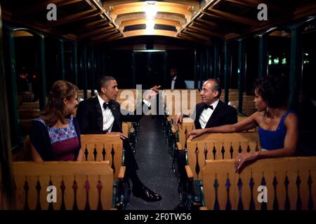 President Barack Obama, First Lady Michelle Obama, President Felipe Calderón of Mexico, and his wife, Mrs. Margarita Zavala, ride a trolley to a tent on the South Lawn of the White House, for the State Dinner reception, May 19, 2010. Stock Photo