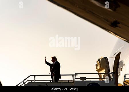 President Donald Trump disembarks Air Force One at Los Angeles International Airport in Los Angeles Tuesday Feb. 18 2020 and is greeted by Mayor of Anaheim California Harry Sidhu Mayor of Lancaster California R. Rex. Parris and supporters. Stock Photo