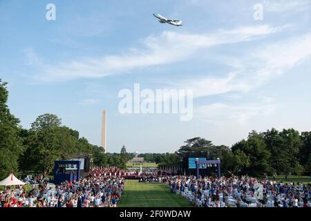 Air Force One flies above the White House Saturday evening July 4