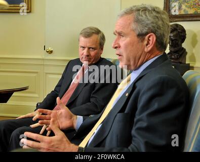 29 February 2008 - Washington, DC - President George W. Bush meets with Jaap de Hoop Scheffer, Secretary-General of the North Atlantic Treaty Organization (NATO), in the Oval Office of the White House. Photo Credit: Ron Sachs/ POOL/Sipa Press/0802291949