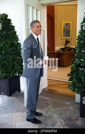 President Barack Obama stands on the Colonnade outside the Oval Office July 31, 2014. Stock Photo