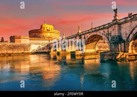 Saint Angel Castle and bridge over the Tiber river in Rome at sunrise Stock Photo