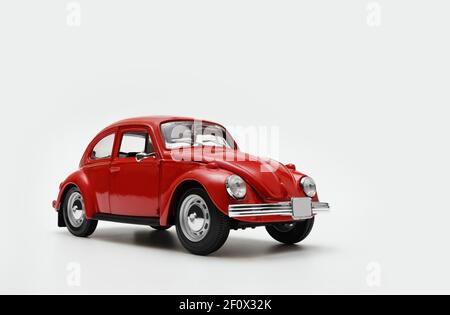 Izmir, Turkey - March 7, 2021: Front view of Red colored toy model car on a white background. Stock Photo