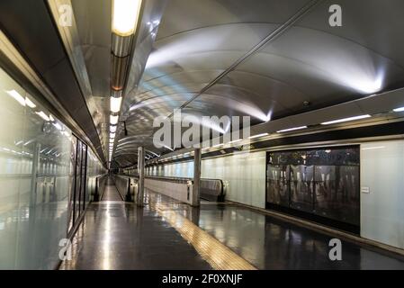 Moving walkway in an empty tunnel of a subway station in Naples, Italy Stock Photo