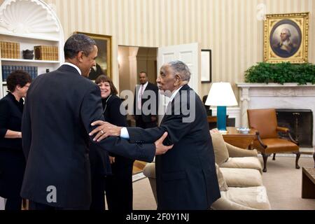 President Barack Obama meets with civil rights movement leader Rev. Dr. Joseph Lowery and his family in the Oval Office Jan. 18 2011. Stock Photo