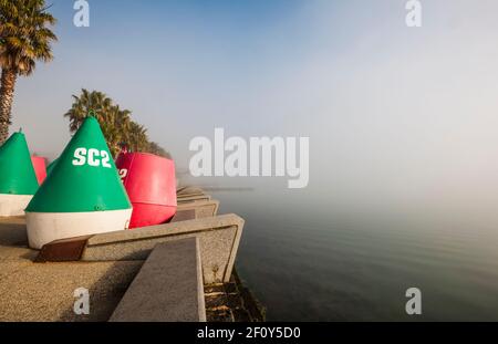 A foggy morning at Eastern Beach with Cunningham Pier in the distance, Geelong, Corio Bay, Victoria, Australia Stock Photo